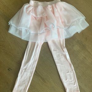 Adorable leggings with tutu skirt.